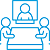 Icon showing two people sitting at a table with another person displayed on a screen, suggesting a video conference or virtual meeting—an inviting way to join the club and connect virtually.