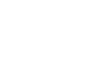A white letter S outlined in a circle with a stylized cougar head inside the letter, on a light gray background, represents our causes and commitment to making a positive impact.